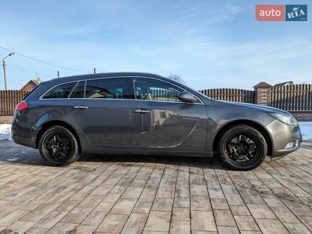 Серый Опель Инсигния, объемом двигателя 1.6 л и пробегом 170 тыс. км за 7000 $, фото 6 на Automoto.ua