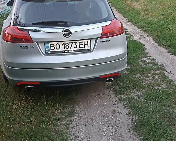Серый Опель Инсигния, объемом двигателя 2 л и пробегом 245 тыс. км за 6700 $, фото 4 на Automoto.ua