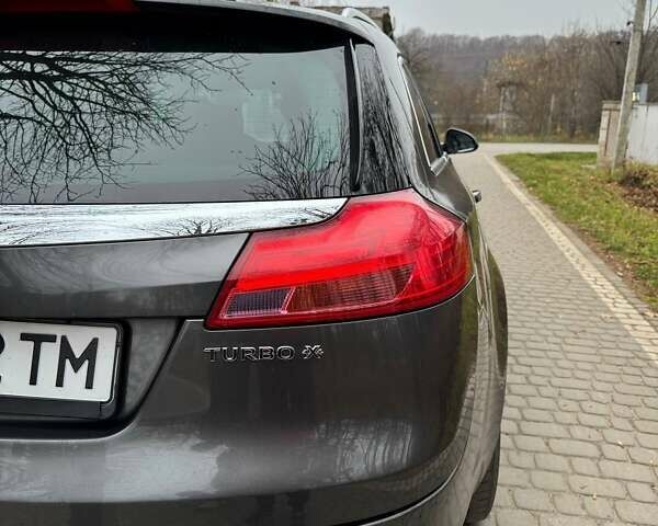 Серый Опель Инсигния, объемом двигателя 2 л и пробегом 210 тыс. км за 6690 $, фото 4 на Automoto.ua