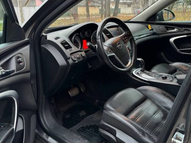 Серый Опель Инсигния, объемом двигателя 2 л и пробегом 210 тыс. км за 159 $, фото 5 на Automoto.ua