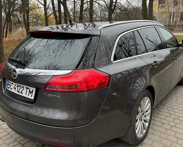 Серый Опель Инсигния, объемом двигателя 2 л и пробегом 210 тыс. км за 6690 $, фото 3 на Automoto.ua