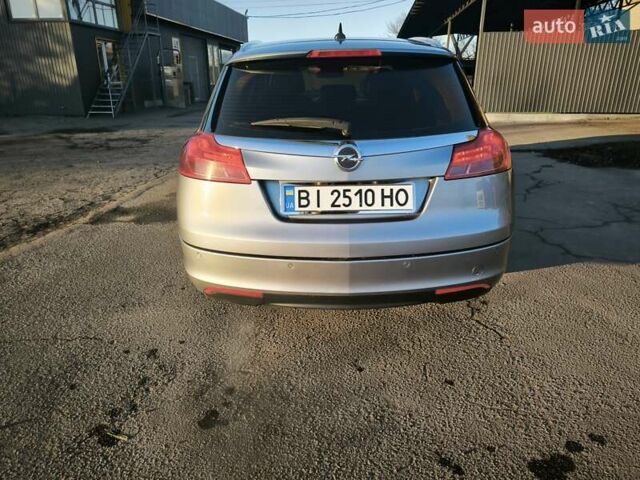 Серый Опель Инсигния, объемом двигателя 1.96 л и пробегом 295 тыс. км за 6500 $, фото 8 на Automoto.ua