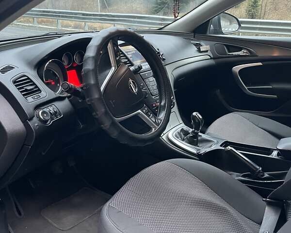 Серый Опель Инсигния, объемом двигателя 1.96 л и пробегом 292 тыс. км за 6300 $, фото 1 на Automoto.ua