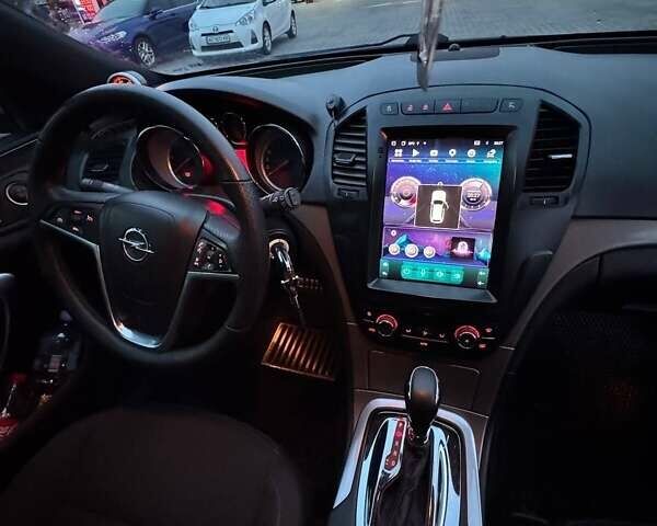 Сірий Опель Інсігнія, об'ємом двигуна 2 л та пробігом 230 тис. км за 7999 $, фото 5 на Automoto.ua