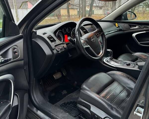 Серый Опель Инсигния, объемом двигателя 2 л и пробегом 210 тыс. км за 6690 $, фото 5 на Automoto.ua