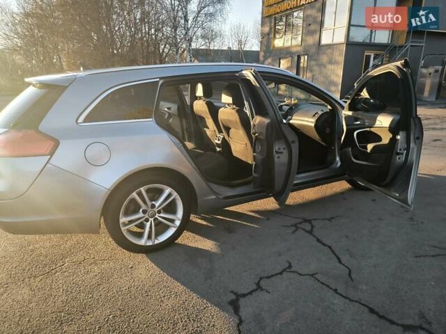 Серый Опель Инсигния, объемом двигателя 1.96 л и пробегом 295 тыс. км за 6500 $, фото 2 на Automoto.ua