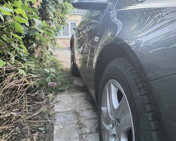 Сірий Опель Інсігнія, об'ємом двигуна 1.96 л та пробігом 240 тис. км за 6500 $, фото 12 на Automoto.ua