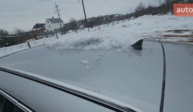 Сірий Опель Інсігнія, об'ємом двигуна 2 л та пробігом 280 тис. км за 5200 $, фото 2 на Automoto.ua