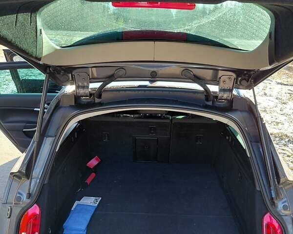 Серый Опель Инсигния, объемом двигателя 2 л и пробегом 238 тыс. км за 8100 $, фото 9 на Automoto.ua