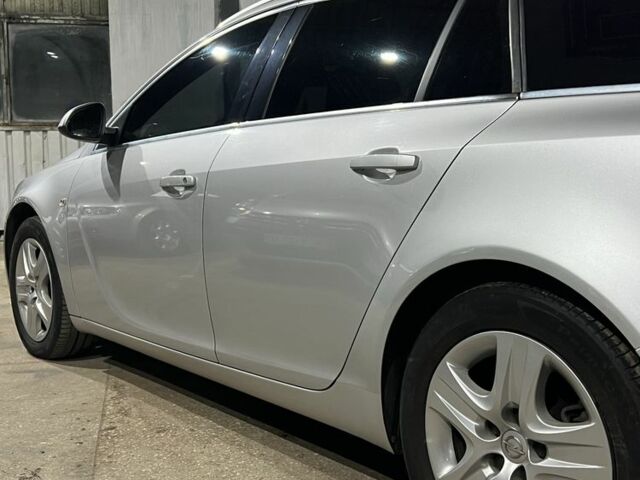 Серый Опель Инсигния, объемом двигателя 1.8 л и пробегом 159 тыс. км за 7999 $, фото 3 на Automoto.ua