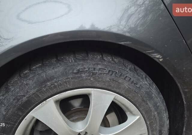 Серый Опель Инсигния, объемом двигателя 1.96 л и пробегом 280 тыс. км за 6800 $, фото 5 на Automoto.ua