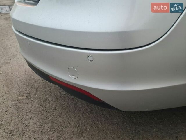 Сірий Опель Інсігнія, об'ємом двигуна 1.8 л та пробігом 222 тис. км за 5999 $, фото 22 на Automoto.ua