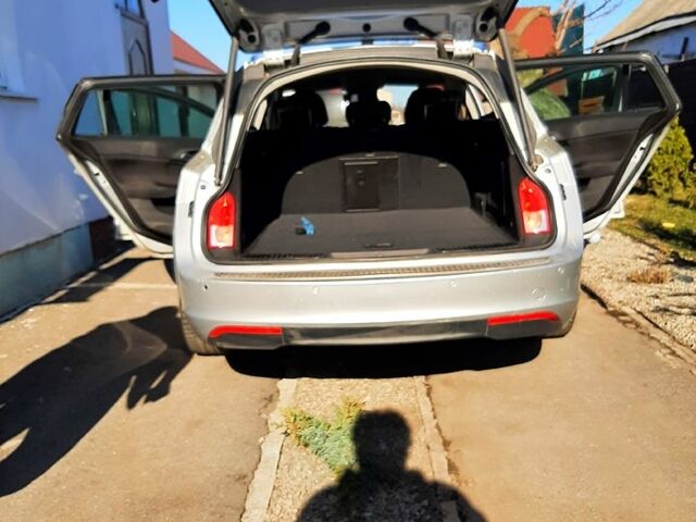 Сірий Опель Інсігнія, об'ємом двигуна 2 л та пробігом 245 тис. км за 7100 $, фото 3 на Automoto.ua