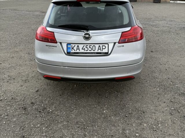 Серый Опель Инсигния, объемом двигателя 2 л и пробегом 265 тыс. км за 6800 $, фото 4 на Automoto.ua