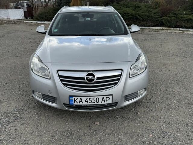 Серый Опель Инсигния, объемом двигателя 2 л и пробегом 265 тыс. км за 6800 $, фото 1 на Automoto.ua