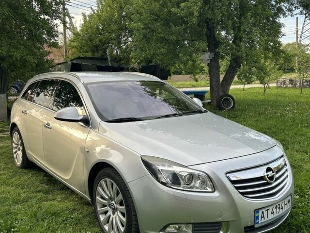 Серый Опель Инсигния, объемом двигателя 2 л и пробегом 256 тыс. км за 8500 $, фото 1 на Automoto.ua