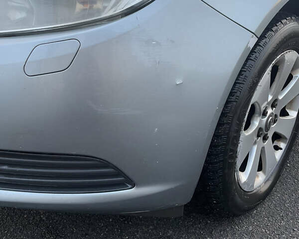 Сірий Опель Інсігнія, об'ємом двигуна 1.96 л та пробігом 301 тис. км за 6500 $, фото 4 на Automoto.ua