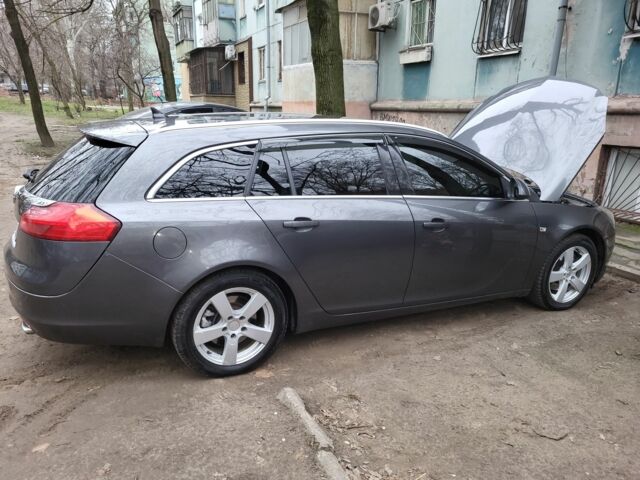 Сірий Опель Інсігнія, об'ємом двигуна 2 л та пробігом 276 тис. км за 6500 $, фото 6 на Automoto.ua