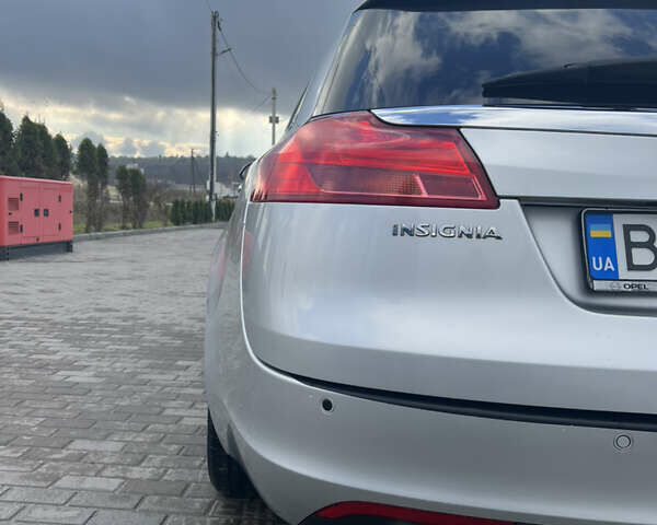 Сірий Опель Інсігнія, об'ємом двигуна 2 л та пробігом 260 тис. км за 8000 $, фото 7 на Automoto.ua