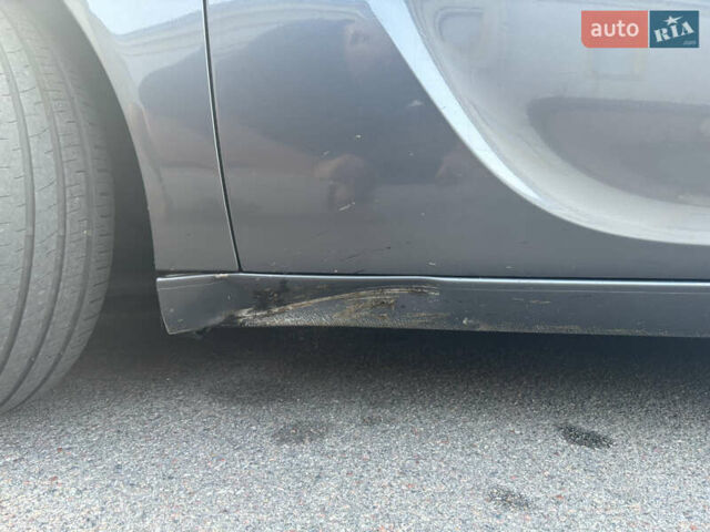 Серый Опель Инсигния, объемом двигателя 1.96 л и пробегом 320 тыс. км за 6999 $, фото 9 на Automoto.ua