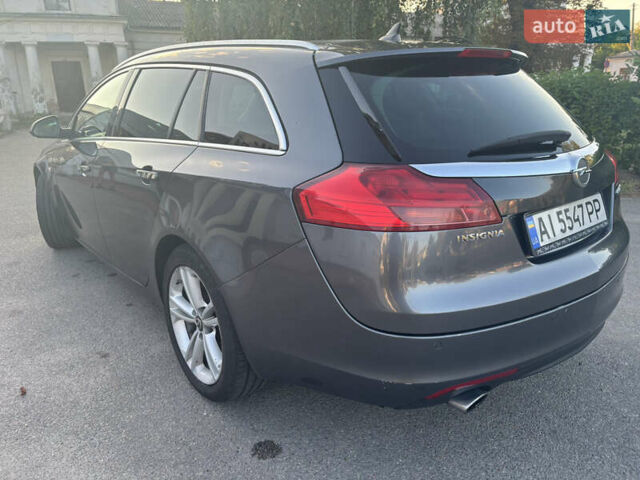 Серый Опель Инсигния, объемом двигателя 1.96 л и пробегом 320 тыс. км за 6999 $, фото 1 на Automoto.ua