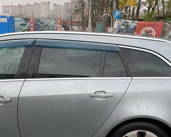 Серый Опель Инсигния, объемом двигателя 1.96 л и пробегом 297 тыс. км за 7400 $, фото 12 на Automoto.ua