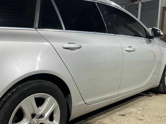 Серый Опель Инсигния, объемом двигателя 1.8 л и пробегом 159 тыс. км за 7999 $, фото 5 на Automoto.ua