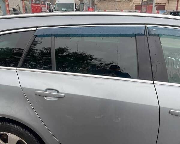 Серый Опель Инсигния, объемом двигателя 1.96 л и пробегом 297 тыс. км за 7400 $, фото 4 на Automoto.ua