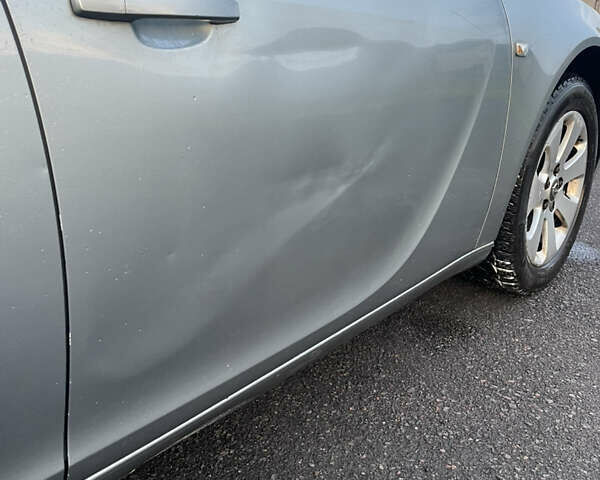 Сірий Опель Інсігнія, об'ємом двигуна 1.96 л та пробігом 301 тис. км за 6500 $, фото 5 на Automoto.ua