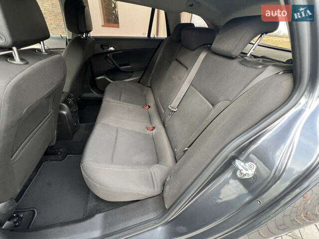 Сірий Опель Інсігнія, об'ємом двигуна 1.96 л та пробігом 244 тис. км за 6699 $, фото 28 на Automoto.ua