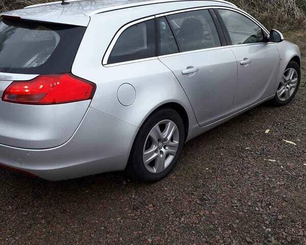 Сірий Опель Інсігнія, об'ємом двигуна 1.8 л та пробігом 160 тис. км за 7999 $, фото 1 на Automoto.ua