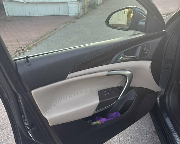 Серый Опель Инсигния, объемом двигателя 1.96 л и пробегом 320 тыс. км за 6999 $, фото 6 на Automoto.ua