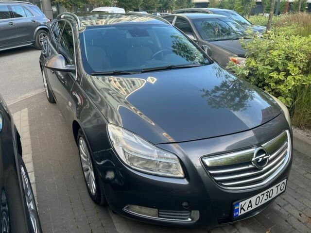 Серый Опель Инсигния, объемом двигателя 2 л и пробегом 310 тыс. км за 8000 $, фото 3 на Automoto.ua