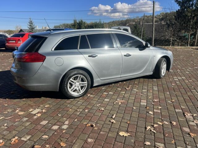 Серый Опель Инсигния, объемом двигателя 2 л и пробегом 357 тыс. км за 6500 $, фото 5 на Automoto.ua