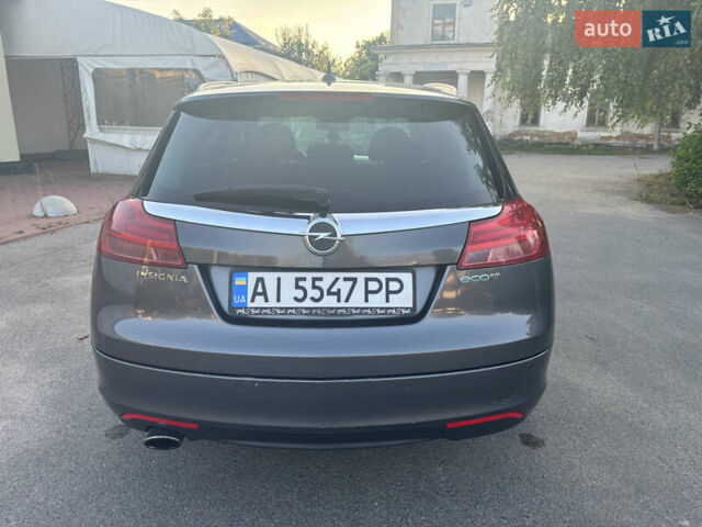 Серый Опель Инсигния, объемом двигателя 1.96 л и пробегом 320 тыс. км за 6999 $, фото 3 на Automoto.ua