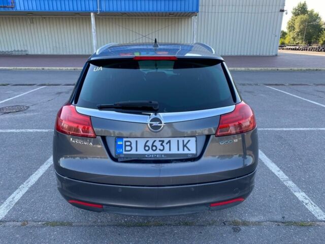 Сірий Опель Інсігнія, об'ємом двигуна 2 л та пробігом 372 тис. км за 6400 $, фото 4 на Automoto.ua
