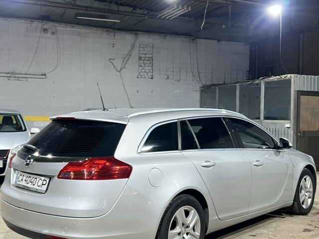 Серый Опель Инсигния, объемом двигателя 1.8 л и пробегом 159 тыс. км за 7999 $, фото 4 на Automoto.ua