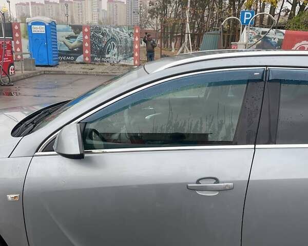 Серый Опель Инсигния, объемом двигателя 1.96 л и пробегом 297 тыс. км за 7400 $, фото 11 на Automoto.ua