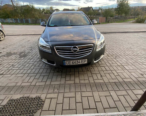 Серый Опель Инсигния, объемом двигателя 2 л и пробегом 260 тыс. км за 9000 $, фото 3 на Automoto.ua