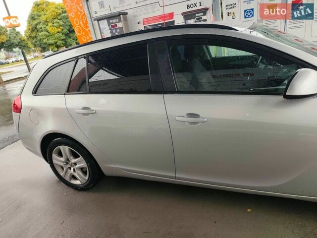 Сірий Опель Інсігнія, об'ємом двигуна 2 л та пробігом 239 тис. км за 7010 $, фото 5 на Automoto.ua