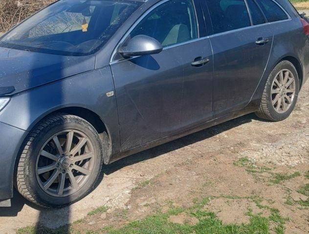 Сірий Опель Інсігнія, об'ємом двигуна 1.96 л та пробігом 298 тис. км за 6700 $, фото 2 на Automoto.ua