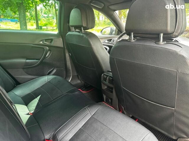 Серый Опель Инсигния, объемом двигателя 2 л и пробегом 282 тыс. км за 10190 $, фото 25 на Automoto.ua