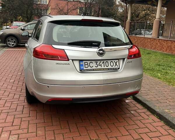 Сірий Опель Інсігнія, об'ємом двигуна 1.96 л та пробігом 297 тис. км за 5850 $, фото 3 на Automoto.ua