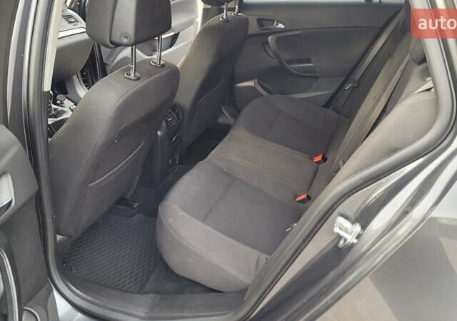 Сірий Опель Інсігнія, об'ємом двигуна 1.96 л та пробігом 307 тис. км за 6500 $, фото 16 на Automoto.ua