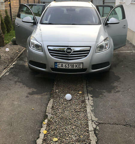Серый Опель Инсигния, объемом двигателя 2 л и пробегом 260 тыс. км за 8000 $, фото 4 на Automoto.ua