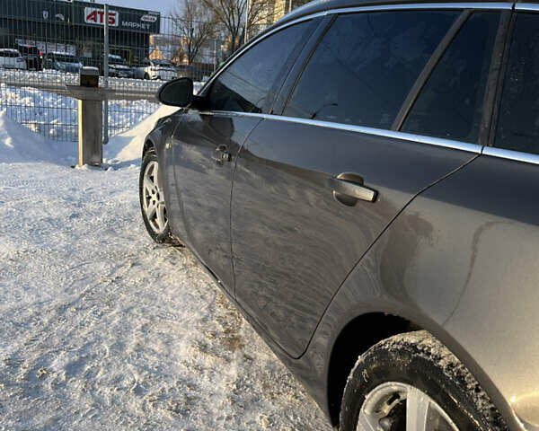 Сірий Опель Інсігнія, об'ємом двигуна 1.96 л та пробігом 310 тис. км за 5650 $, фото 4 на Automoto.ua