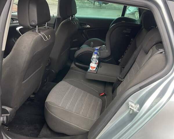 Серый Опель Инсигния, объемом двигателя 1.96 л и пробегом 297 тыс. км за 7400 $, фото 28 на Automoto.ua