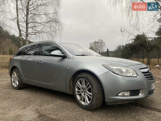 Сірий Опель Інсігнія, об'ємом двигуна 1.96 л та пробігом 203 тис. км за 6999 $, фото 1 на Automoto.ua