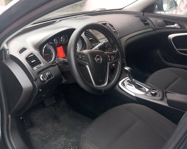 Сірий Опель Інсігнія, об'ємом двигуна 2 л та пробігом 260 тис. км за 6800 $, фото 6 на Automoto.ua