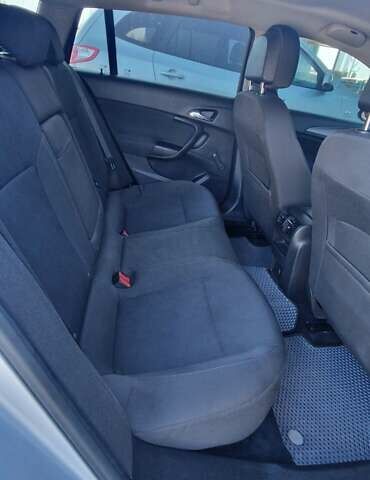 Серый Опель Инсигния, объемом двигателя 2 л и пробегом 292 тыс. км за 6700 $, фото 8 на Automoto.ua